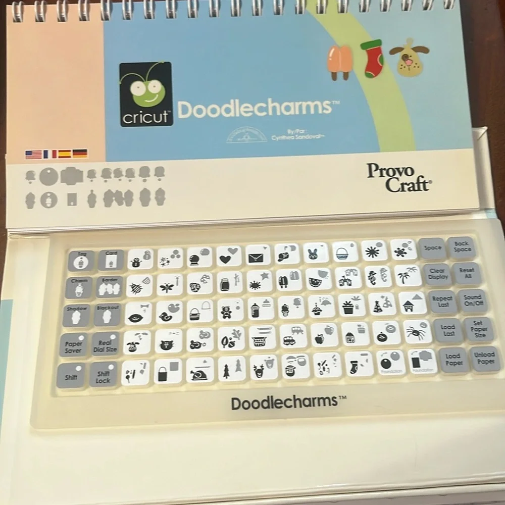 Cricut cartridge. Doodlecharms. Linked